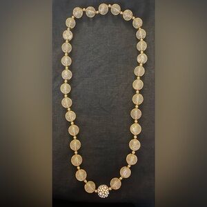 Gold mesh and rhinestone globe necklace
